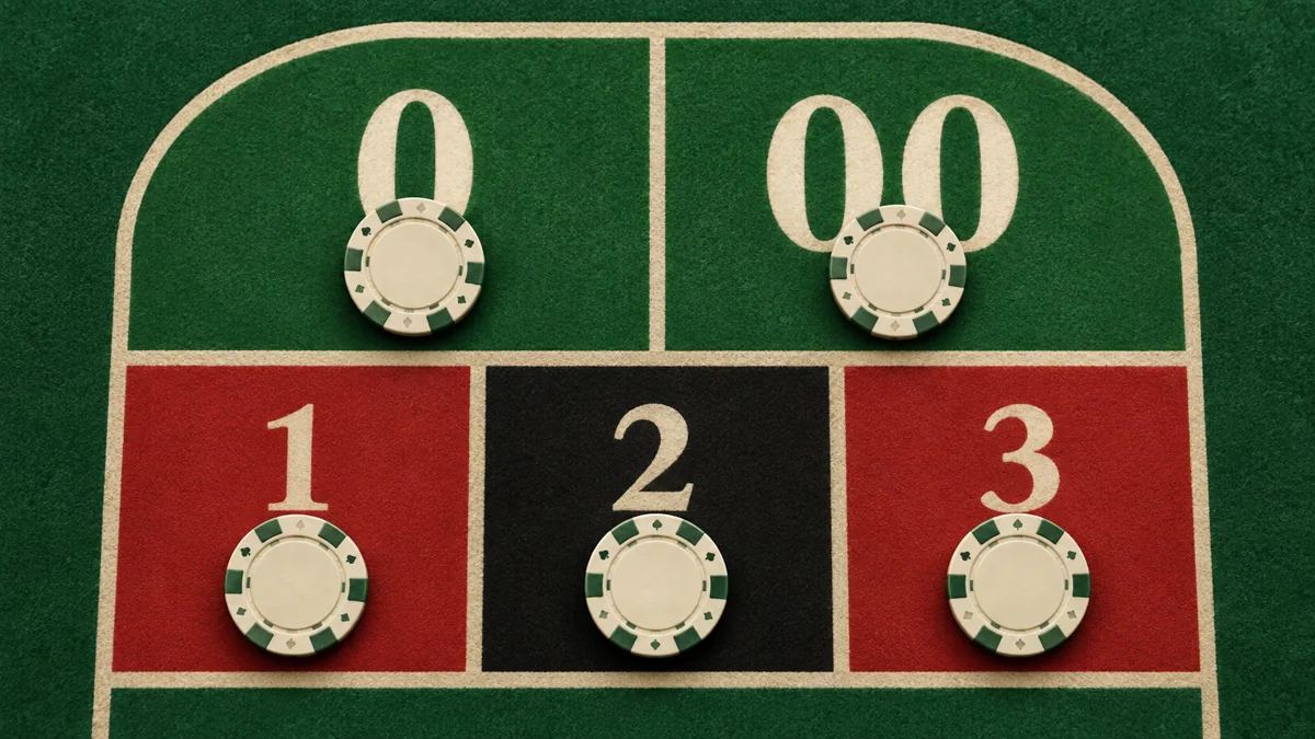 Five cream chips on roulette spaces marked zero, double zero, one, two and three
